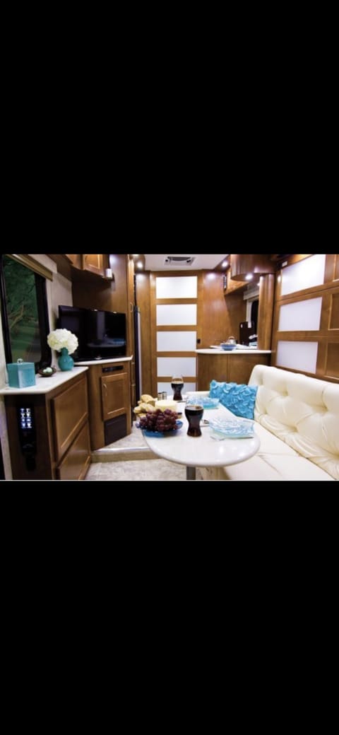 this RV is so new that it still smells like it came from the factory with the leather luscious luscious leather everywhere!