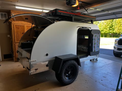 Rooftop tent closed.  We store our camper in the garage all winter.  Tent is very thin when closed making it aerodynamic while trailering.