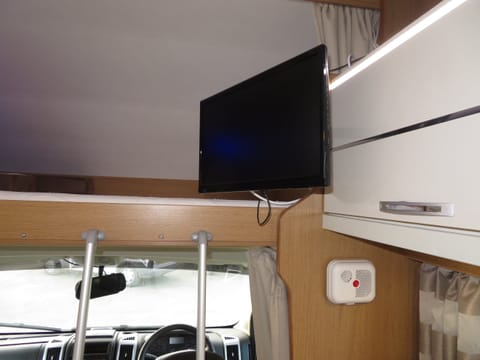 Overhead bed with TV