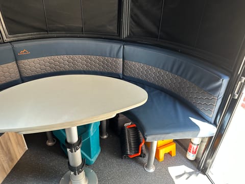 Primary dinette. We can get our family of 5 around this for games or meals on rainy days.