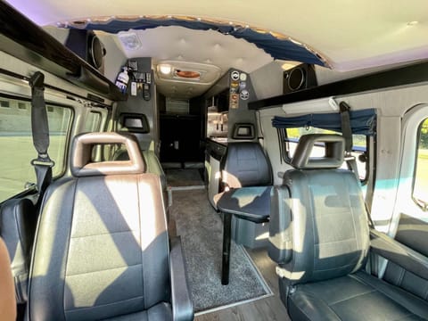 Roadtrek’s classic design feels like a spacious studio apartment! Three small skylight windows provide lots of sunlight, with curtains for privacy. 