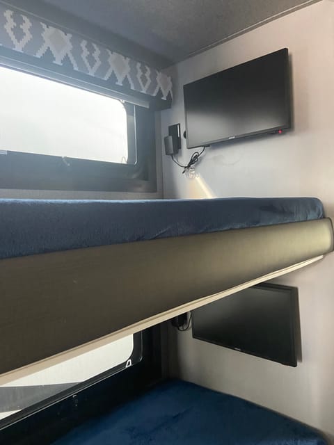 Mid-bunk has TV with DVD players.