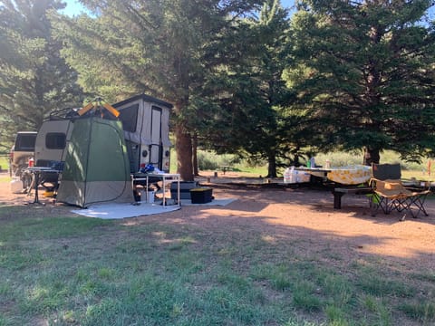 Tent set up for port-a-potty and shower.