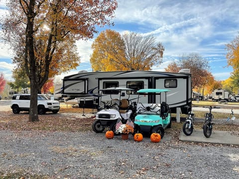 Camper and available golf carts and E-bikes