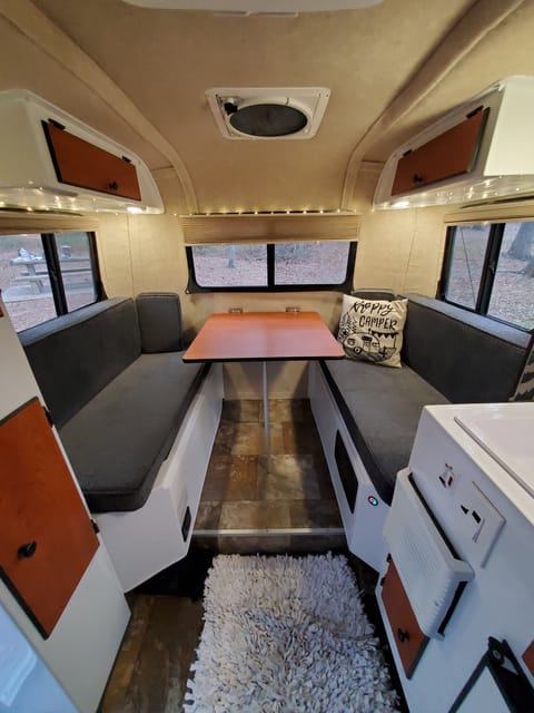 Julep has a booth style dining table that has plenty of room to enjoy your camping meals.