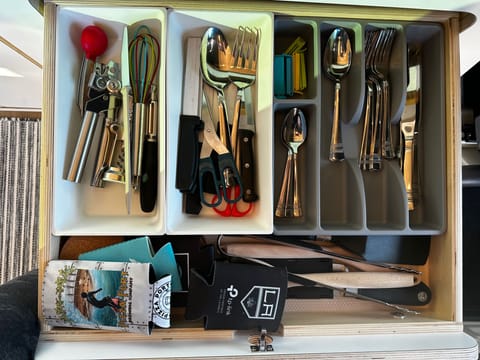 5 sets of silverware and serving utensils 