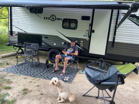 We have added a second outside rug and a small side table.  