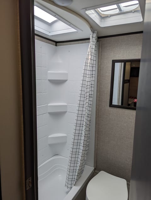 Including a toilet, shower, and tub!