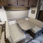 Convertible dinette for additional sleeping capacity