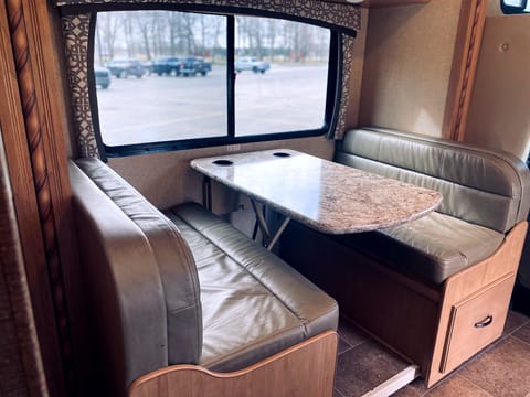 Dining table converts to a bed. 