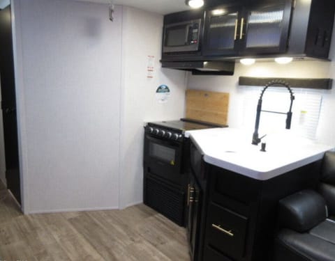 Full Kitchen for interior cooking. Can provide crockpot and electric skillet- just ask for more details! 
