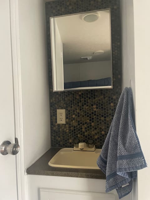 Bathroom sink outside bathroom