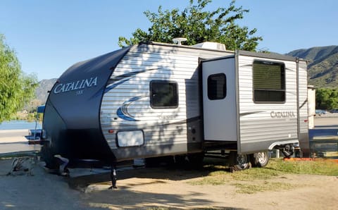 A beautiful set up with slide out in front of the lake!