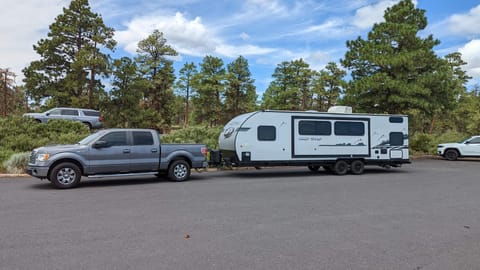 Some half-ton pickup trucks may be able to tow this camper. You must have an electronic brake controller installed and use the sway control hitch.