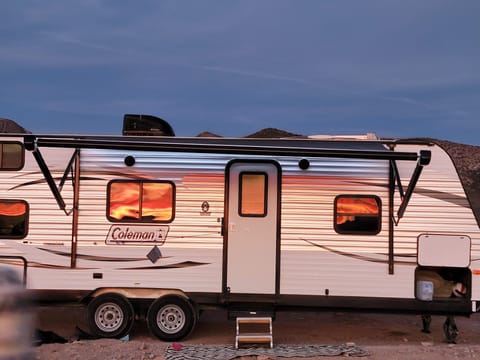 LED Lights, plenty of storage, canopy, secure lock/door, steps, everything you'll need to get off the grid.
