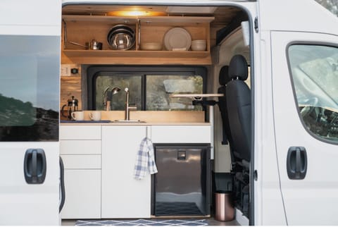 Entrance into the van with access to the dinning.