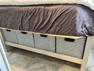Be extra comfy and a touch from home on our comfortable 10” memory foam mattress!  Storage bins under the master bed. 
