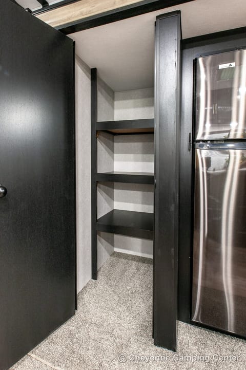 Huge pantry: Can store food items and clothes for kids on the bunk beds.