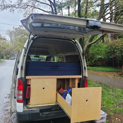 Two large drawers at the back provide ample storage space. 