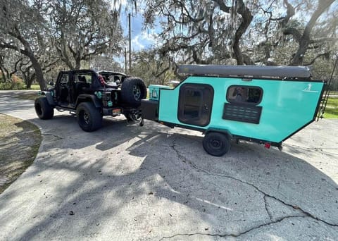 Here is the trailer hooked up and ready to go.  There is a cooler strapped to the front.  It's not included.