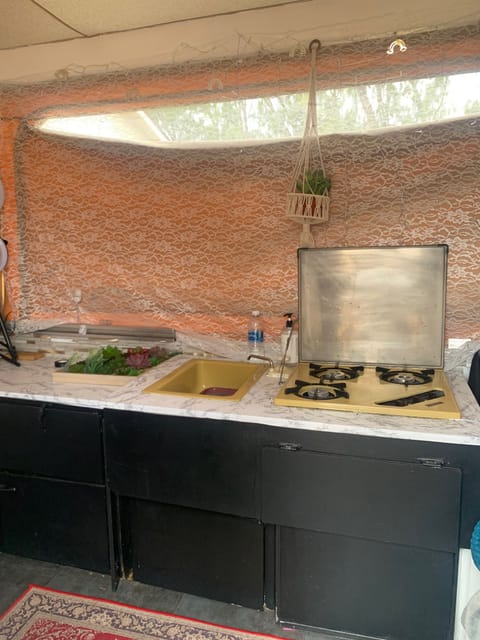 3 burner stove and sink … propane and water tank available.