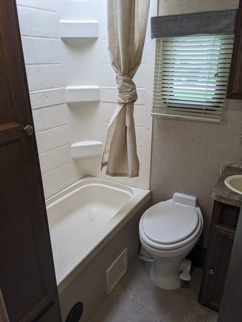 You won't need to hunch in this shower! Extra space for adults and deep enough for a bath for the kiddos.