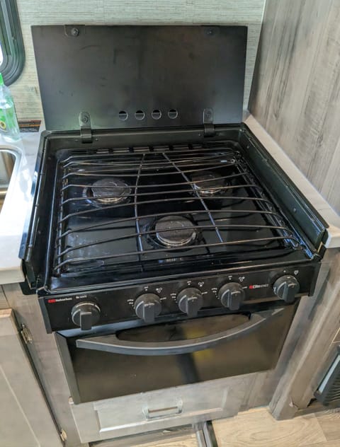 Three burner stove top and oven.  Many newer RVs this size don't have an oven.  Some things are just better cooked in an oven!
