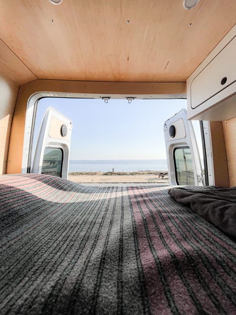 View of the water from the bed.