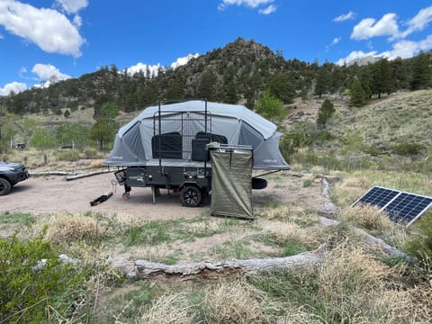 Exterior with privacy shower tent and solar panel