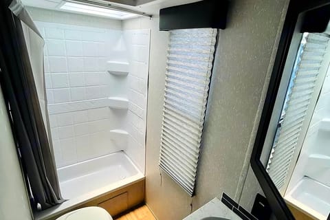 Bathroom equipped with tub shower