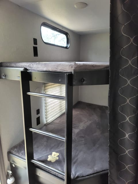 Full size dual bunks in rear for adults or children