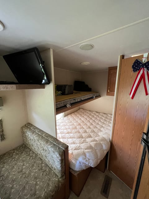 Back bunk room area with full size bed