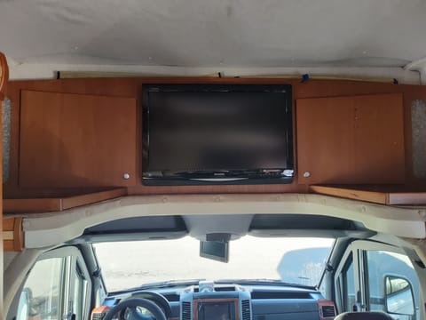 TV with DVD player and storage on either side