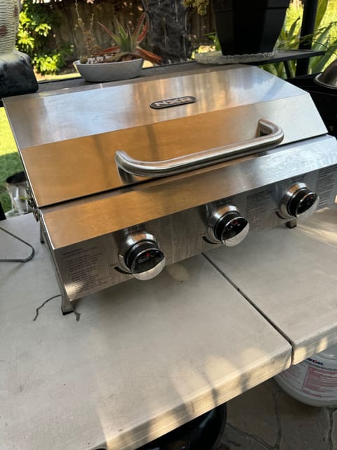 Portable external grill for easy and clean outdoor grilling so you don’t have to use the campsite grills.