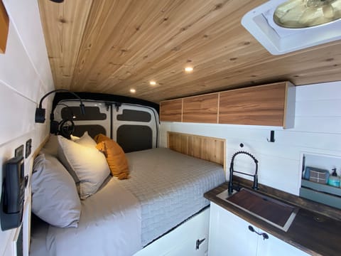 NEW! Overhead Cabinetry with 3 spacious cubbies for clothes and pantry