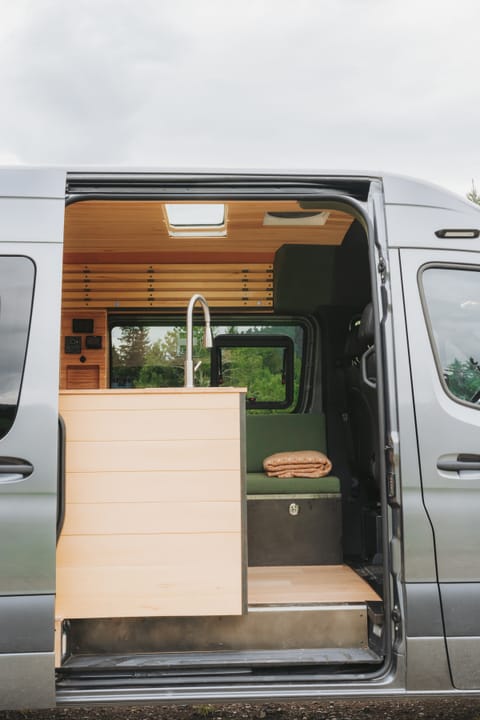 Side entry to the galley kitchen and bench seat