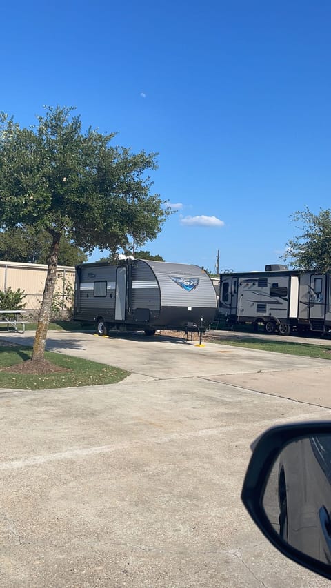 Parking next to trailer.