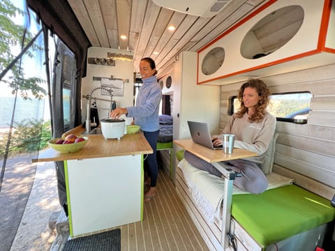 Designed with your ultimate satisfaction in mind, our camper van boasts a spacious and well-appointed living area.