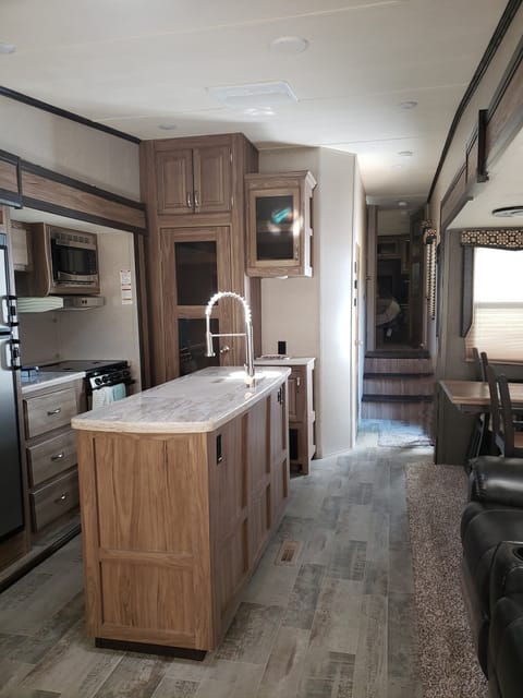 Kitchen area with dinette. Plenty of room for cooking and playing games
