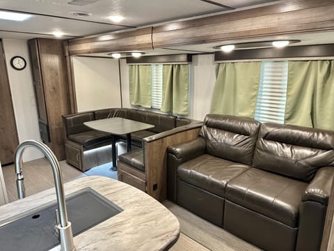 Enough seating for the whole family. Play games around the table or convert the dinette and sofa to beds for everyone to sprawl out and watch a movie!