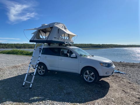 Olly the Outlander + Theo the Thule Tepui Rooftop Popup Tent RV in Dartmouth