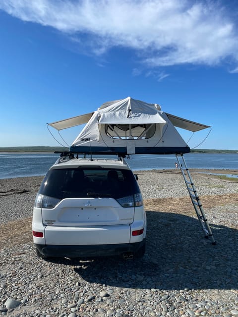 Olly the Outlander + Theo the Thule Tepui Rooftop Popup Tent camper in Dartmouth