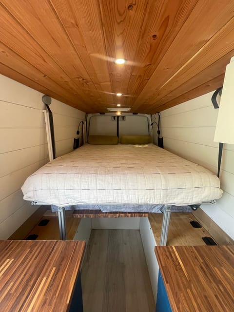 Our full size bed is just as comfy as it is functional, lowering from the ceiling via electric motor in a matter of seconds. 