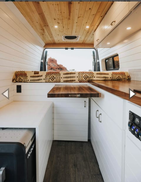 Pull out table is great for extra counter space, eating, and working.