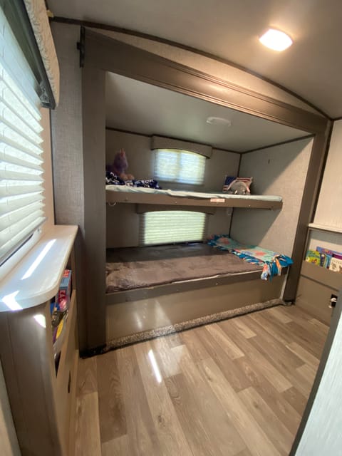 Pretty spacious bunk room. Friends and cousins have built a pallet for sleepovers with all that floor space. 