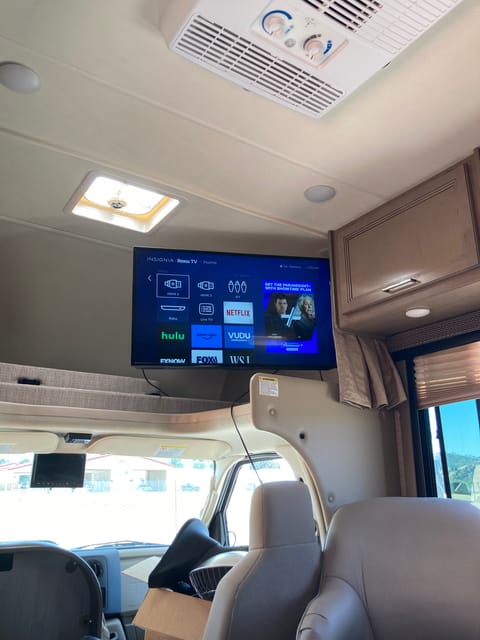 Roku Smart TV which can run while driving for your passenger’s entertainment. 
