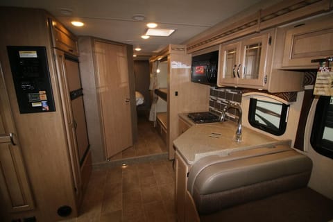 Galley looking back to the kitchen and bunk beds and master bedroom.