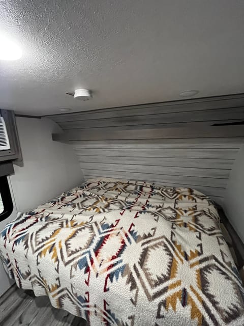 Queen size bed with storage above