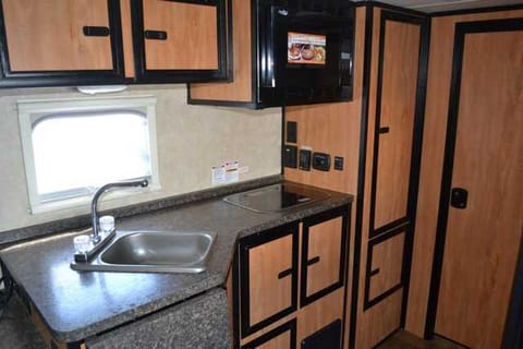 We added a Toaster oven hanging under the left cabinet.