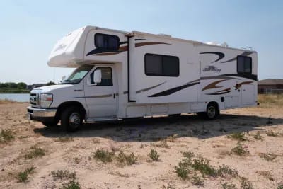 32 ft Class C RV! 2 slide outs, plenty of under carriage storage, and easy to drive!